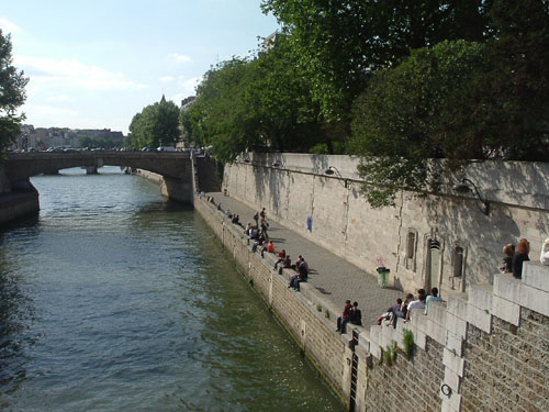 Watching the Seine roll by. 