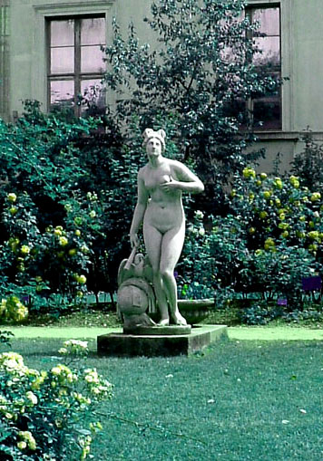 Naked in the garden.